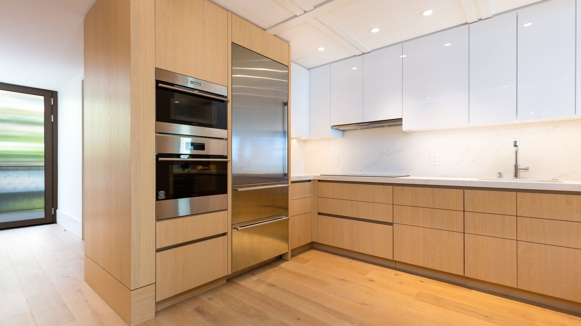 Modern kitchen with wooden cabinets.