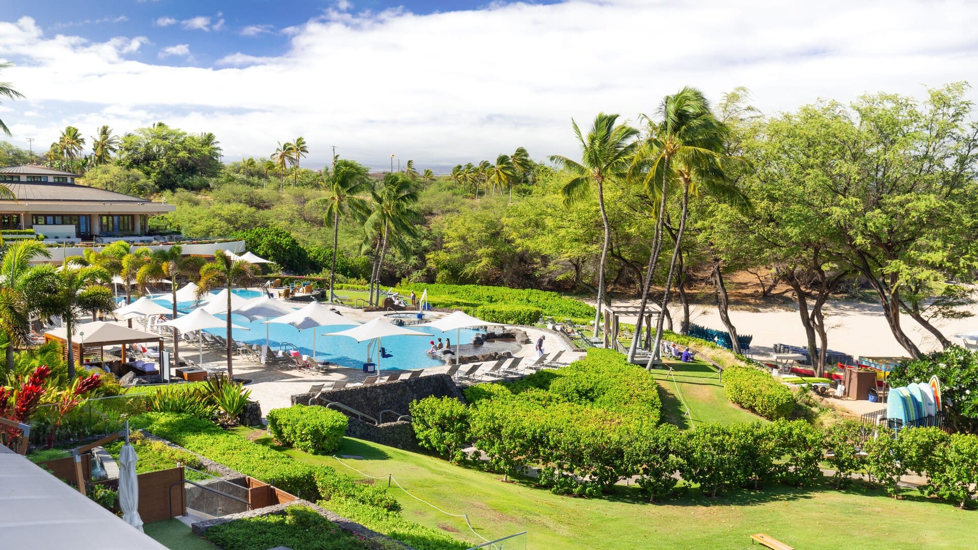 Tropical resort with pool area.