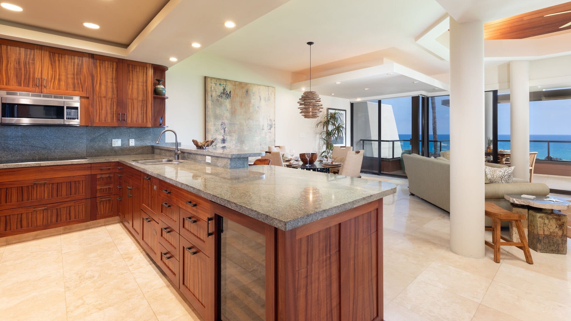 Modern kitchen and living room, ocean.