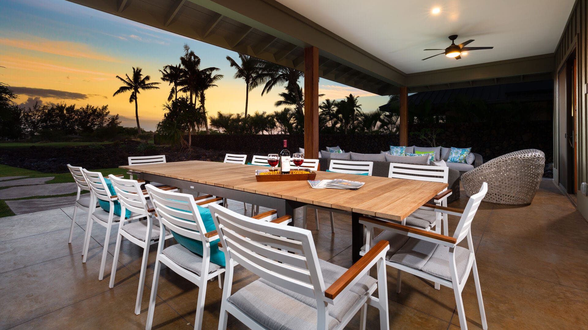 Outdoor patio with table at sunset.