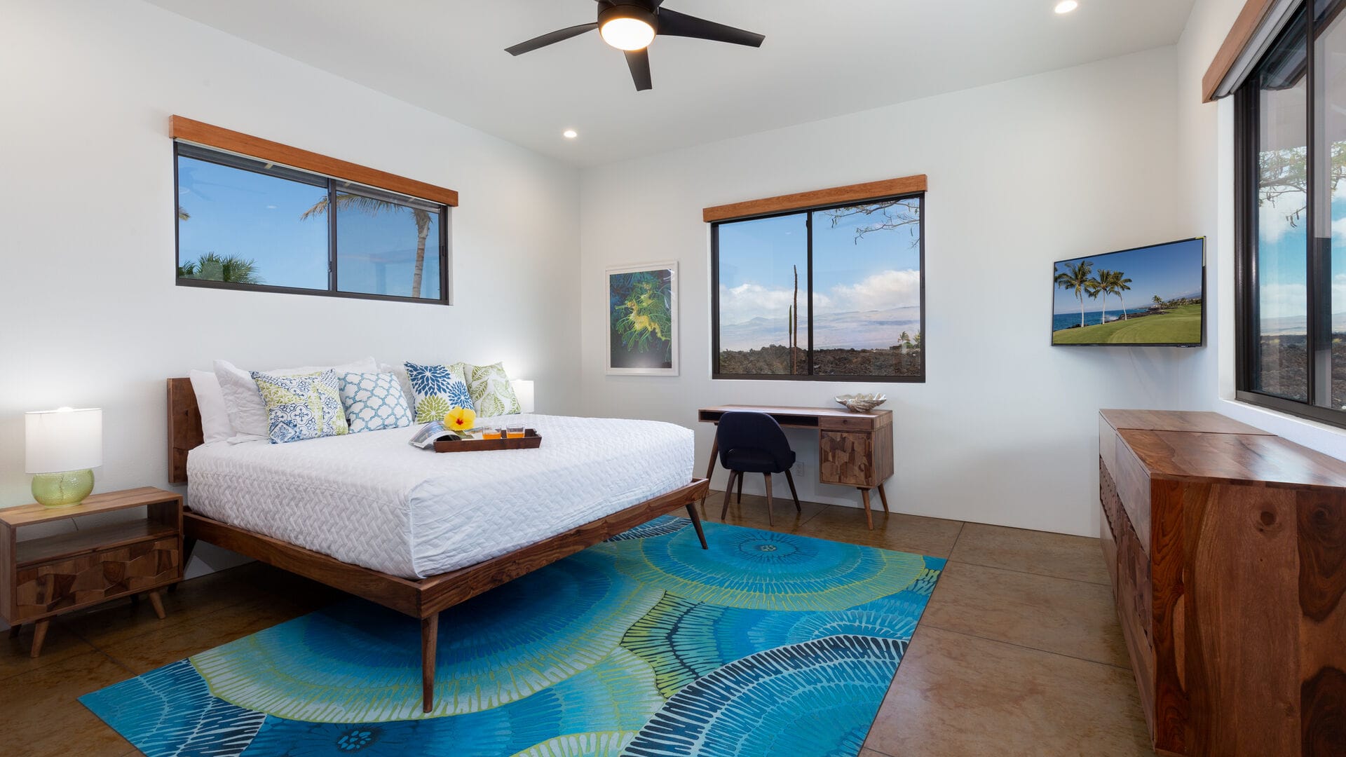 Modern bedroom with colorful accents.