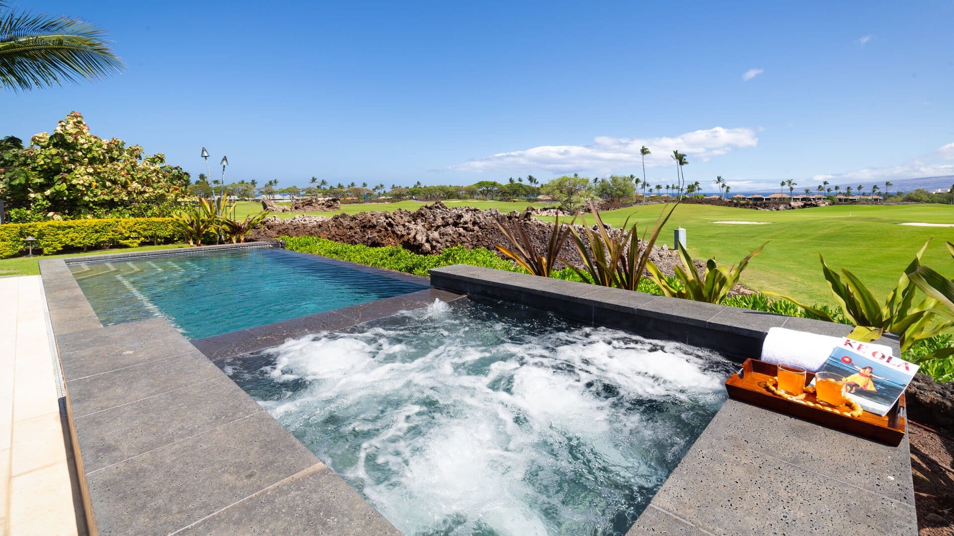 Hot tub and pool overlooking golf.