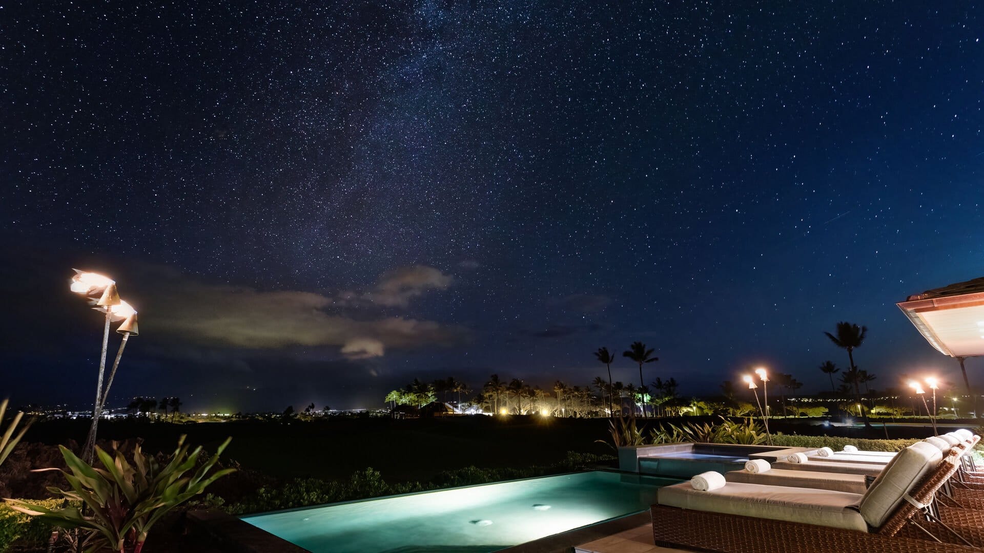 Starry night over pool area.