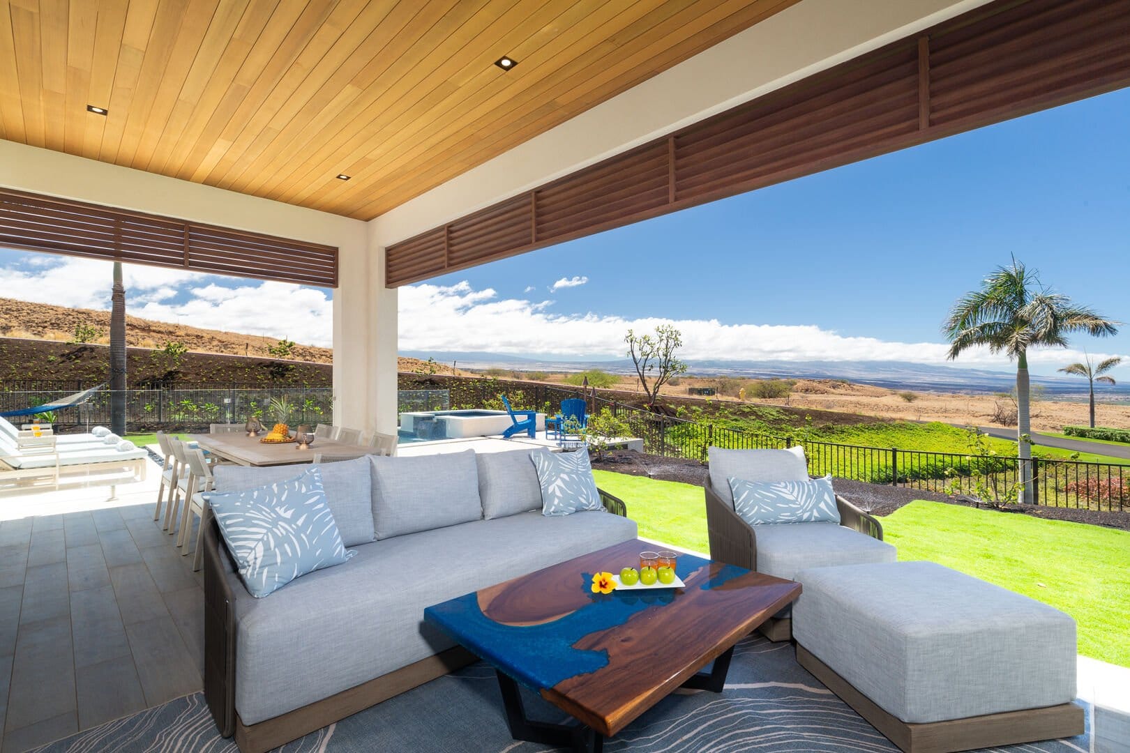 Outdoor lounge area with scenic view.