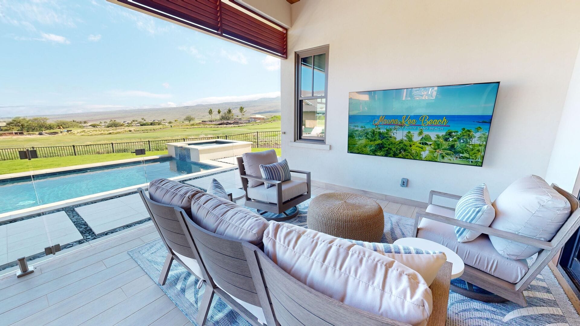 Outdoor patio with pool view.