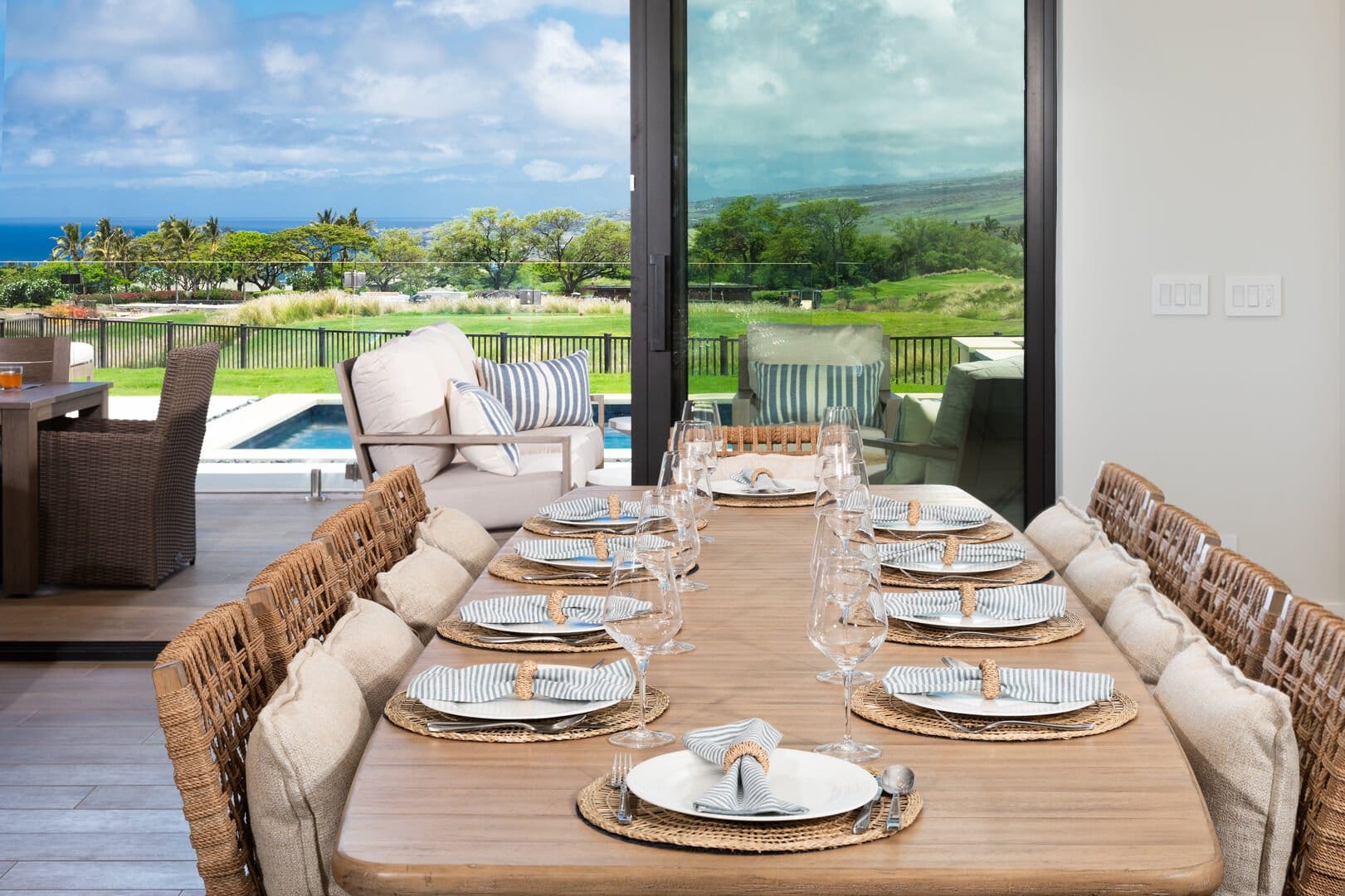 Elegant dining setup with outdoor view.