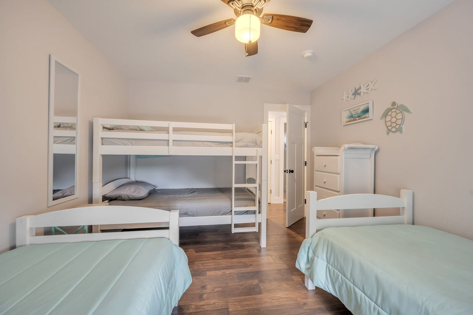 Children's bedroom with bunk and beds