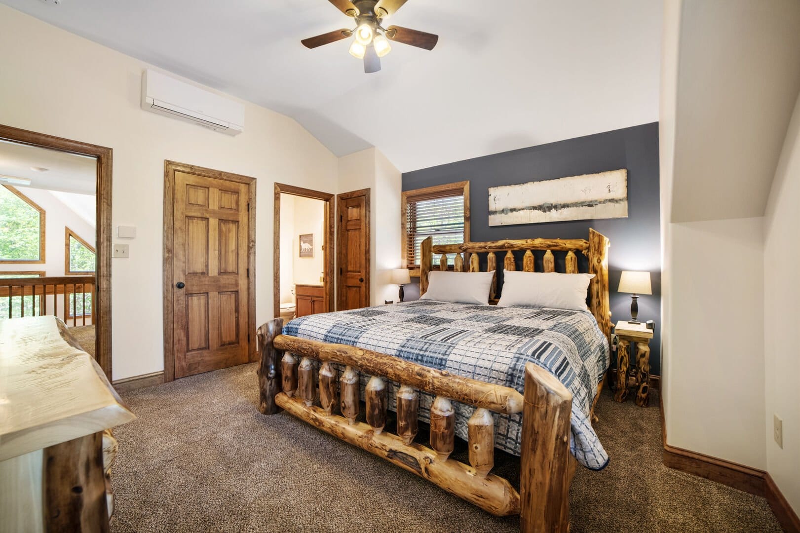 Rustic bedroom with log furniture.