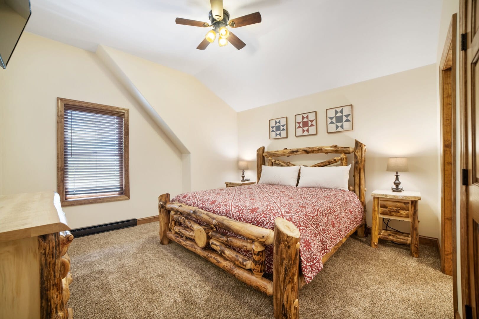 Rustic bedroom with log bed.