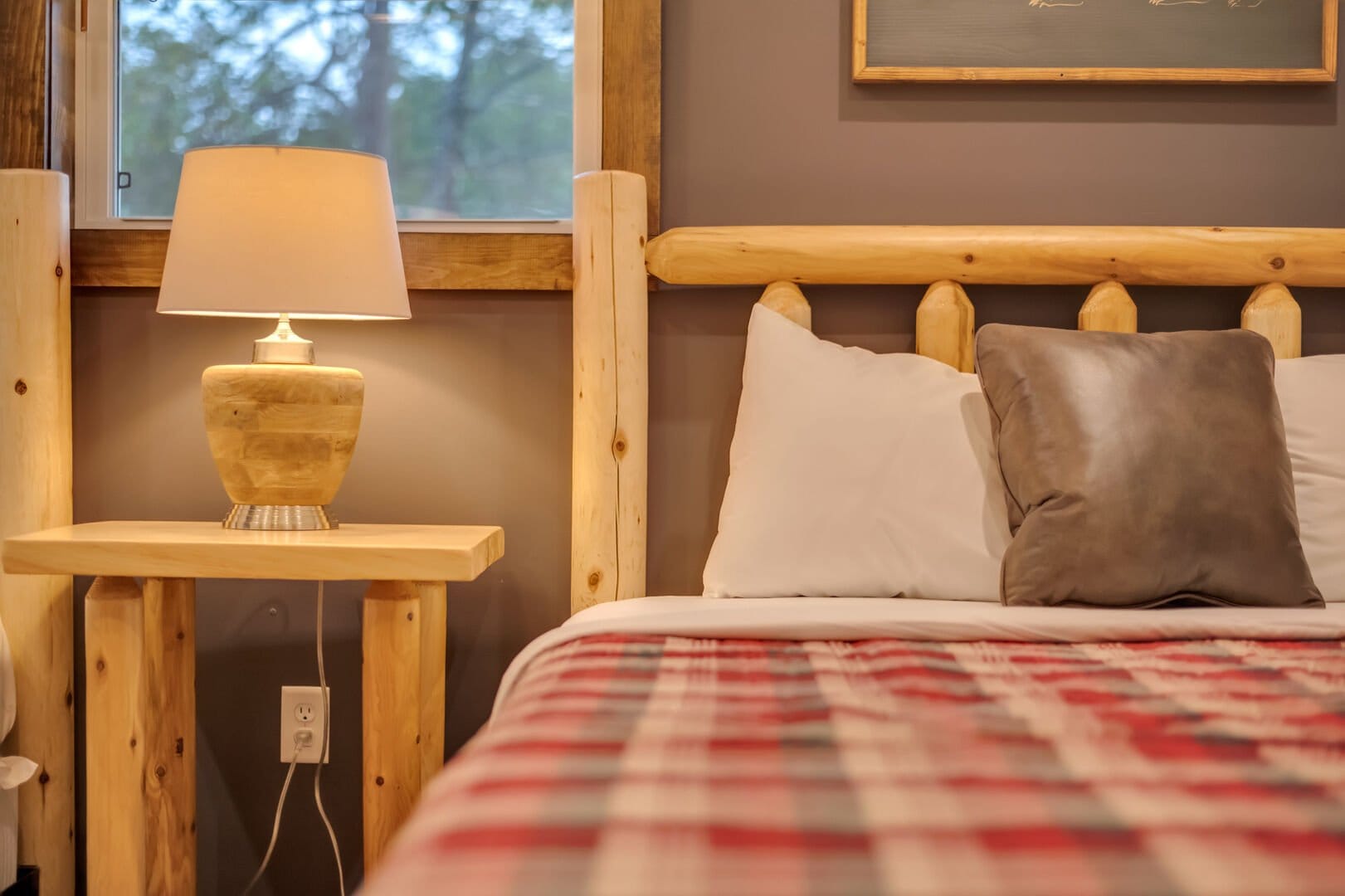 Rustic bedroom with cozy bed.