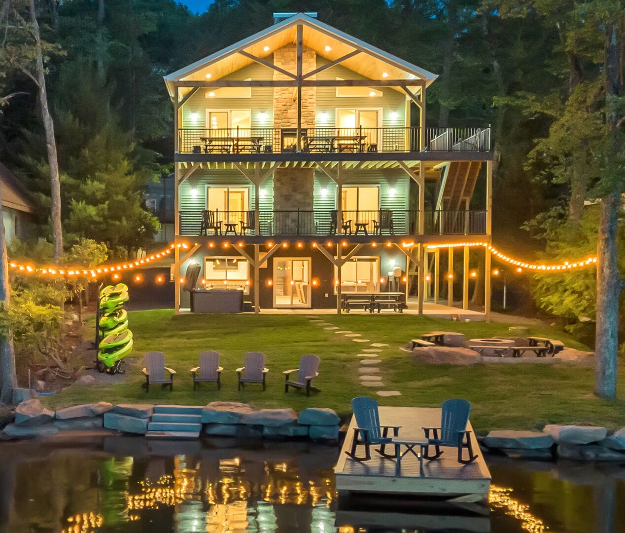 Lakeside cabin with string lights.