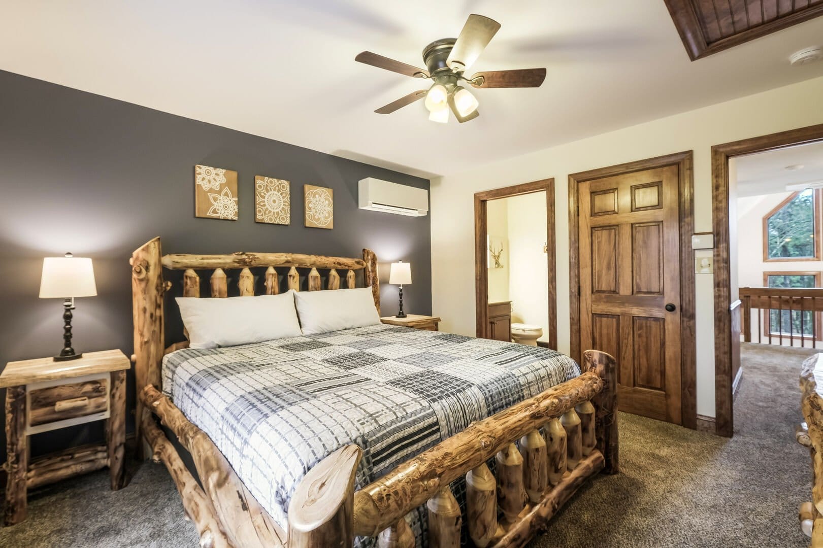 Rustic bedroom with wooden furniture.