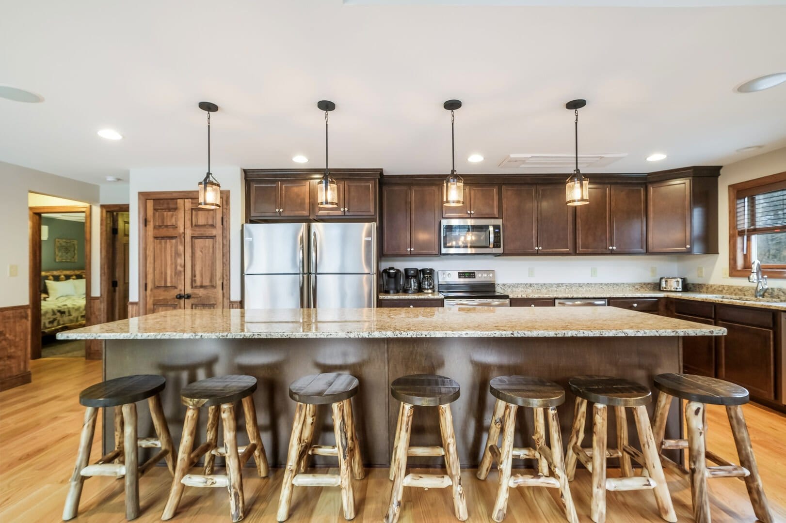 Modern kitchen with wooden stools.