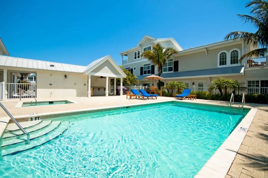 Outdoor pool with lounge chairs.