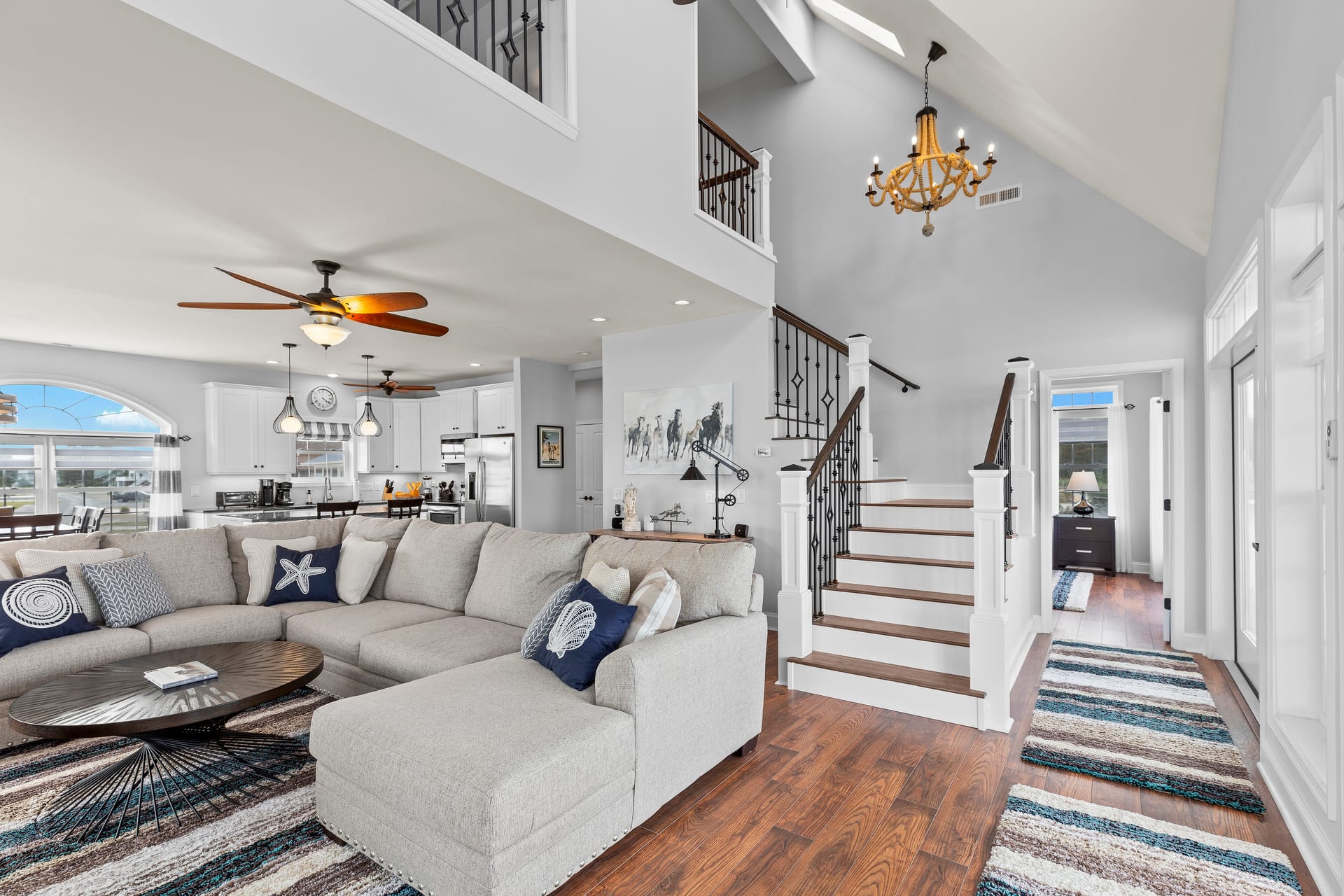 Modern living room with staircase.