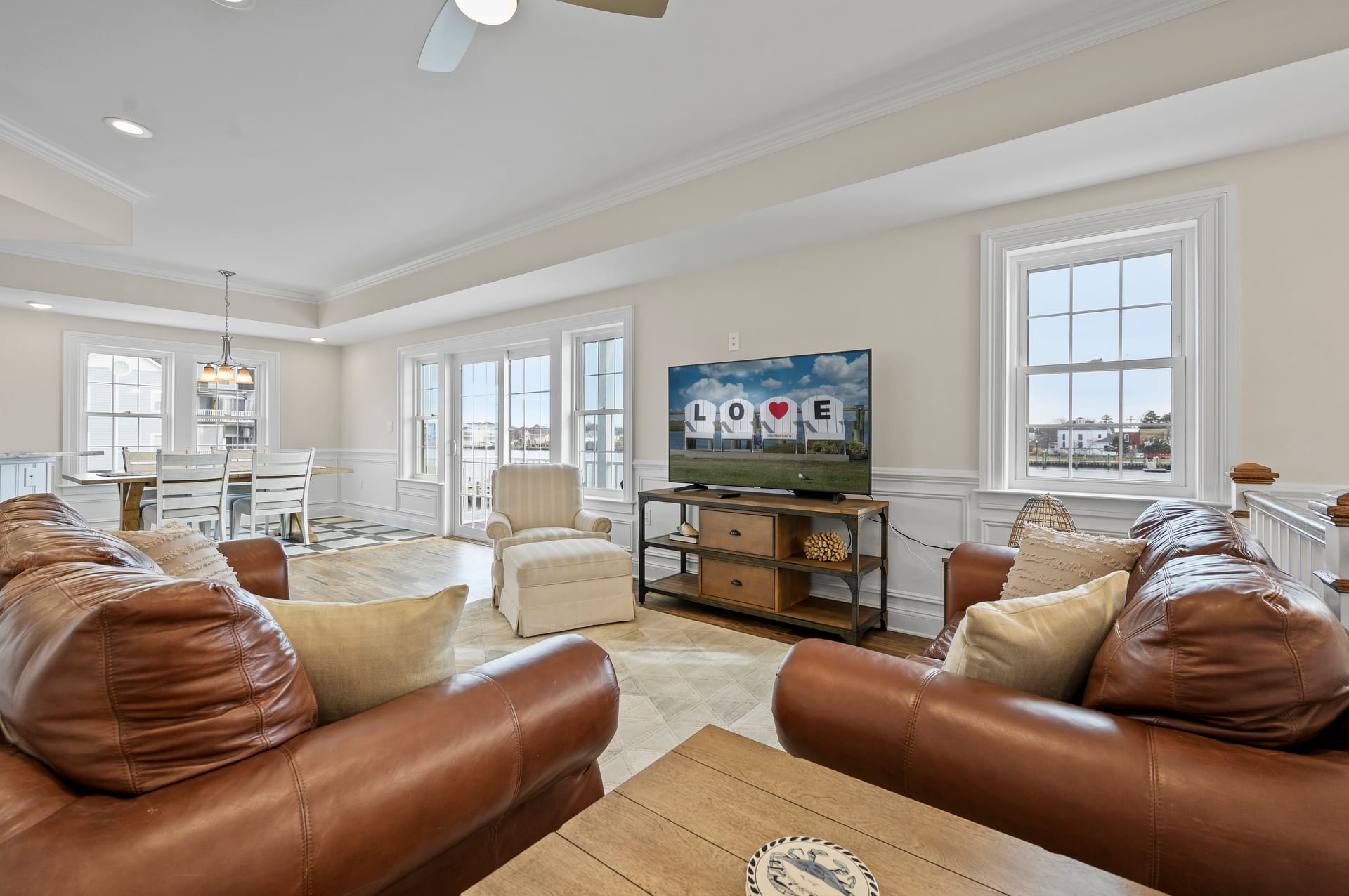 Spacious living room with TV.