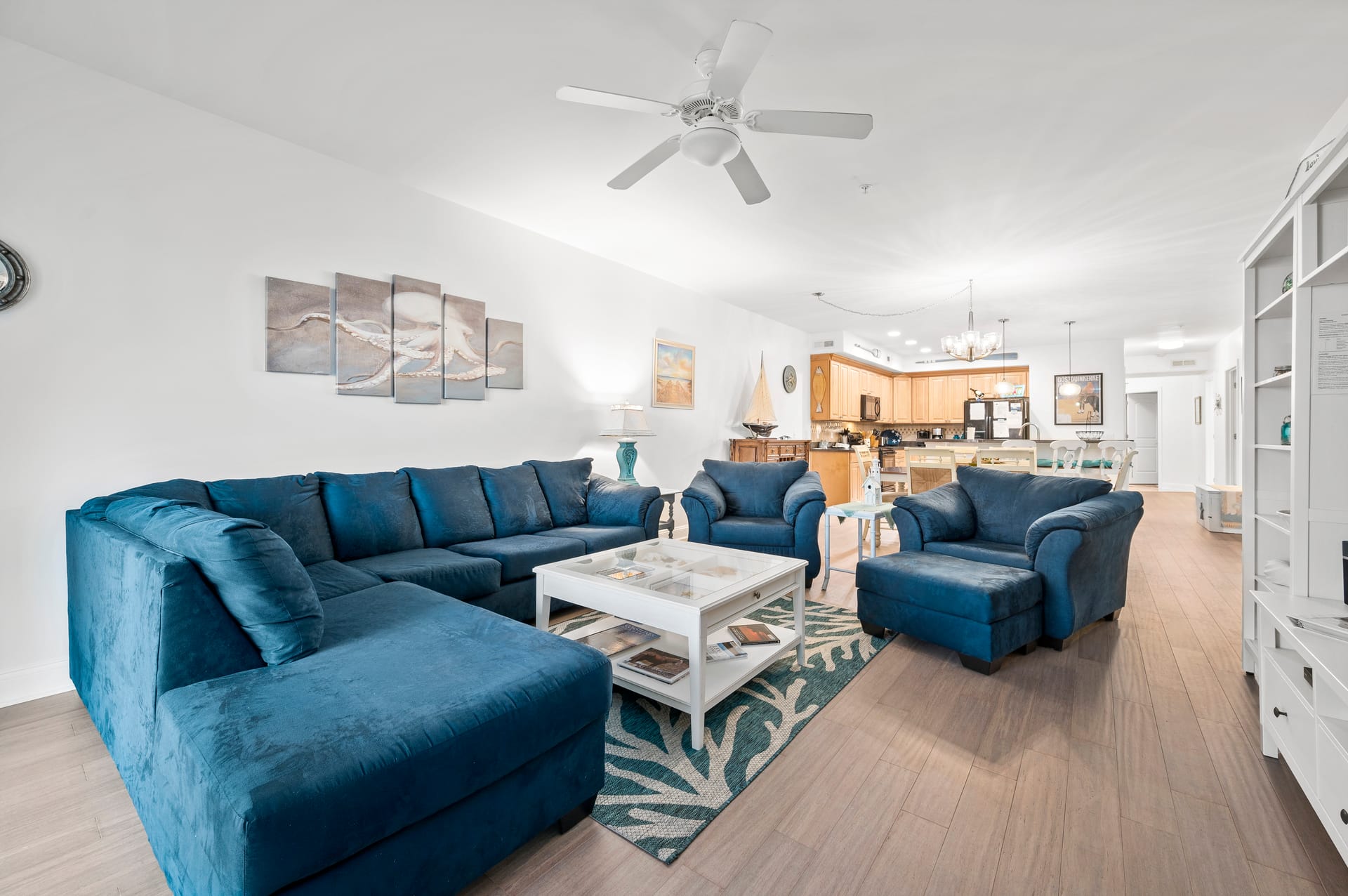 Modern living room with blue furniture.