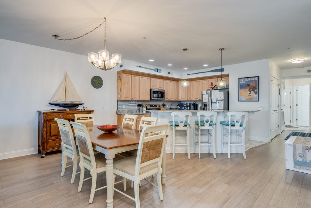 Open-concept dining and kitchen area.