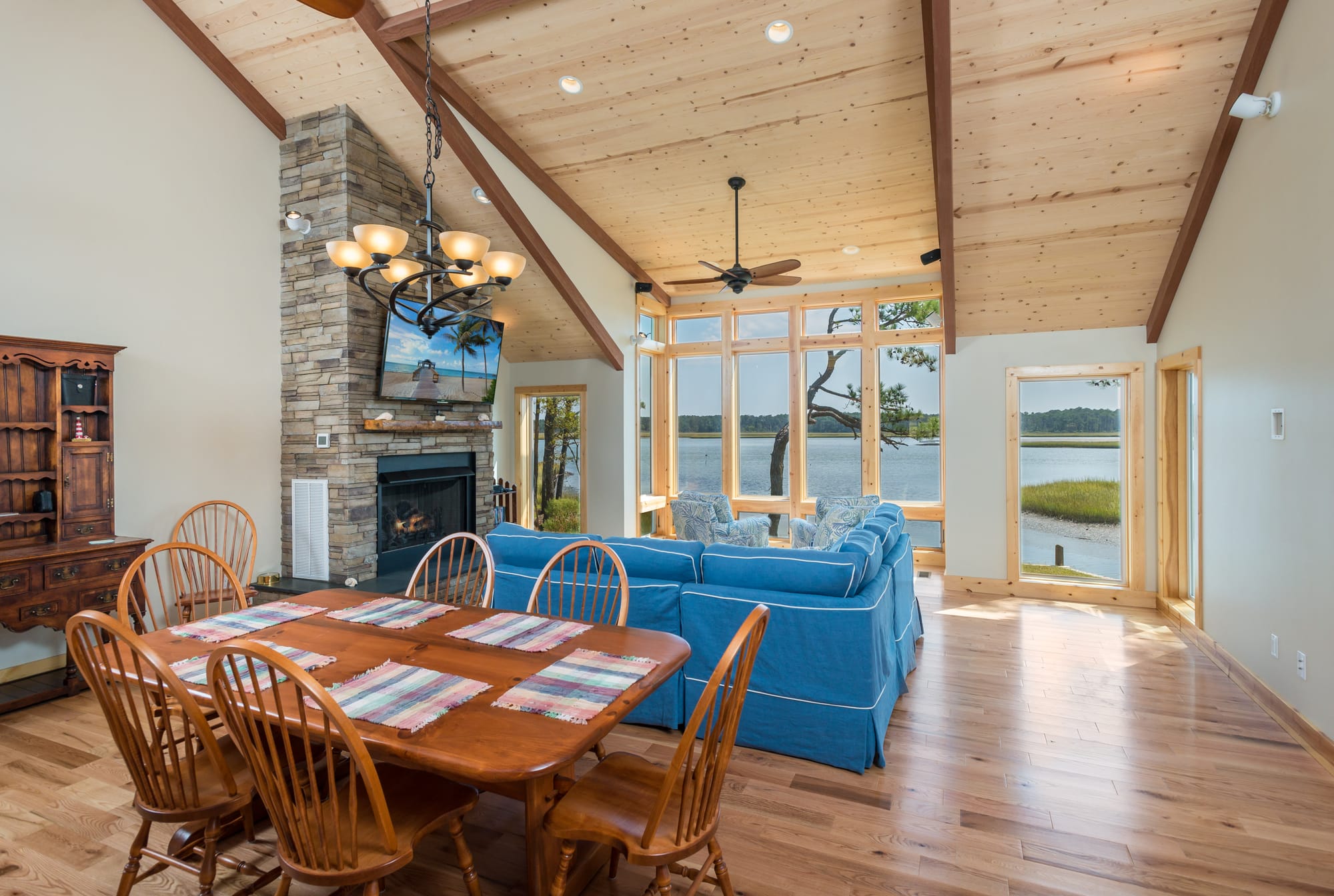 Lakeside living room with large windows