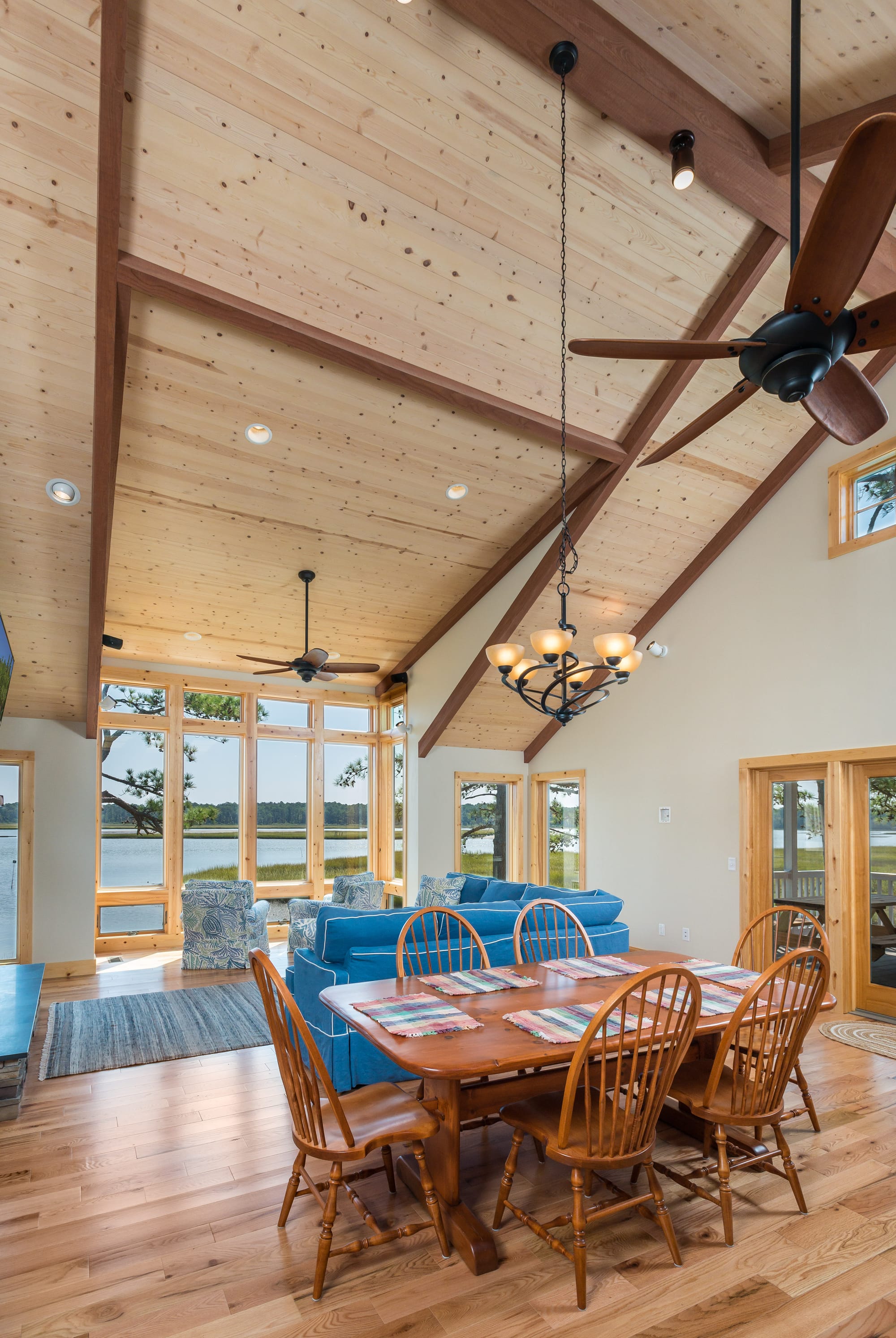 Wooden cathedral ceiling living space.