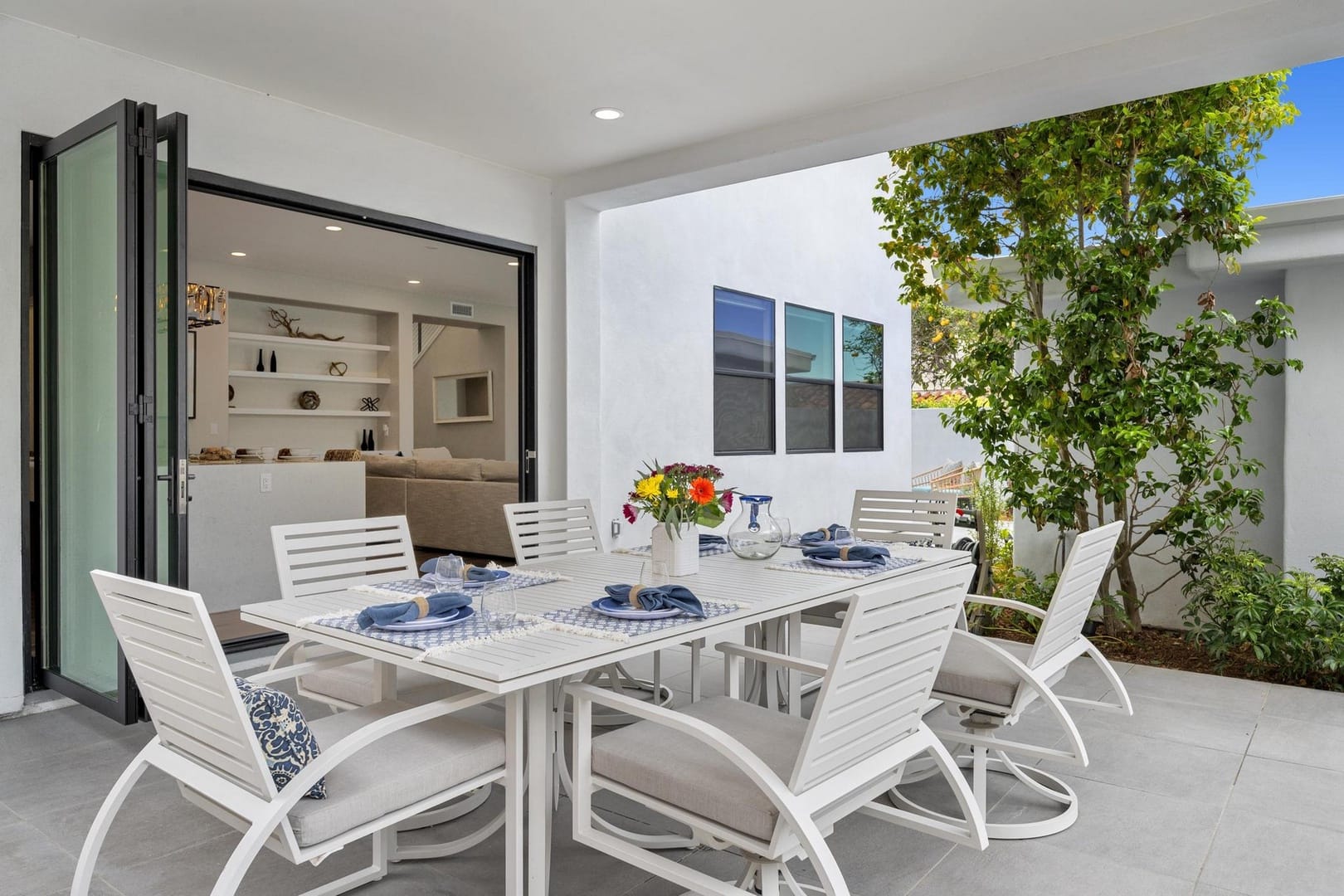 Outdoor dining area with flowers.