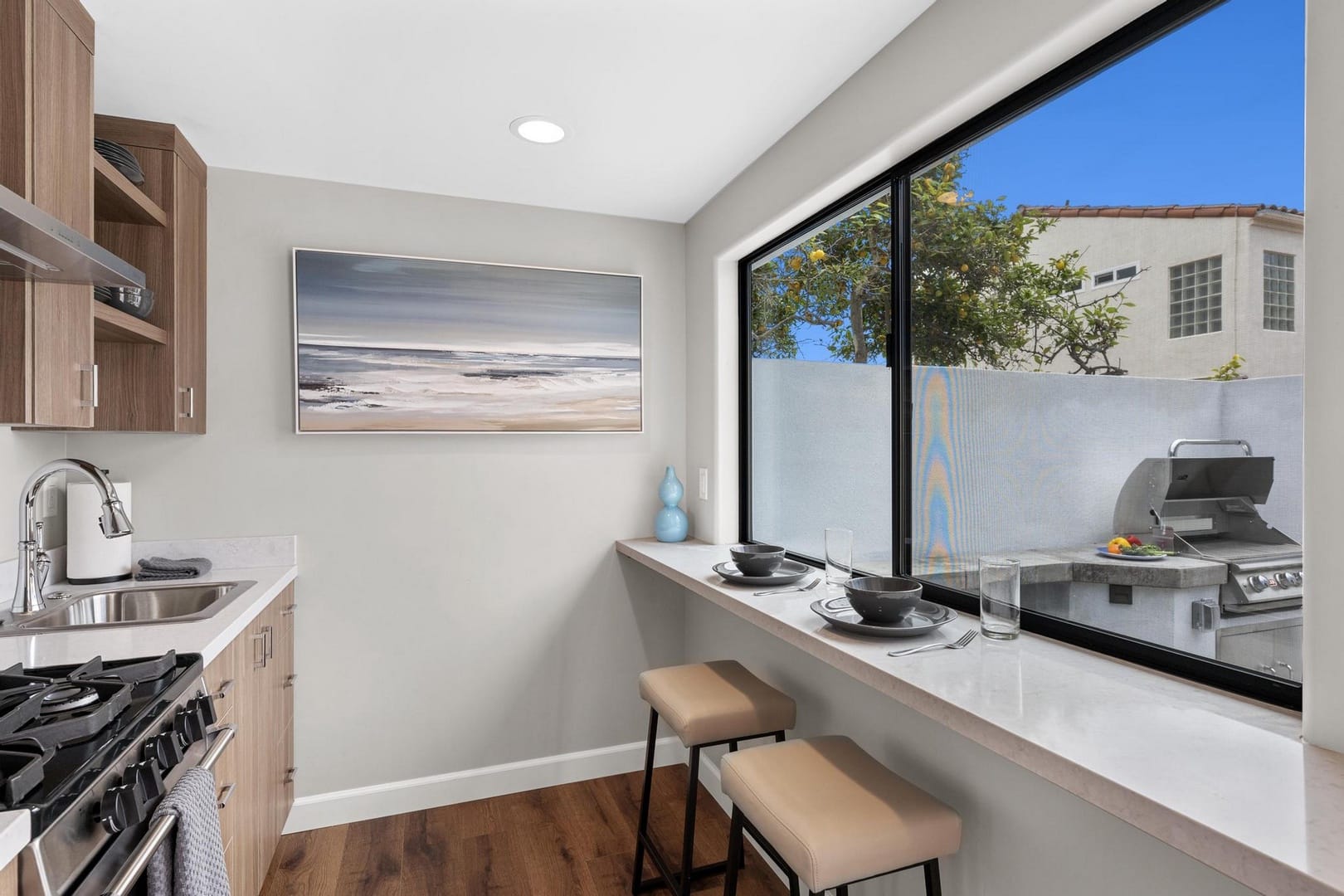 Modern kitchen with window seating.