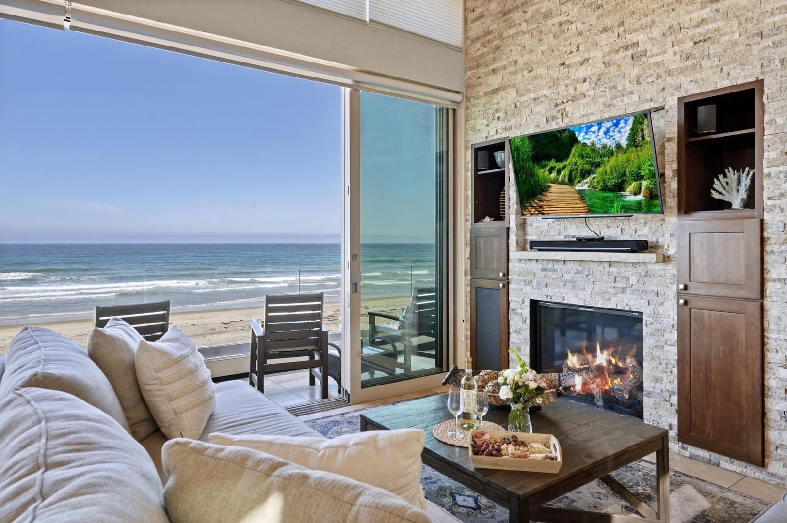 Beachfront living room with ocean view.