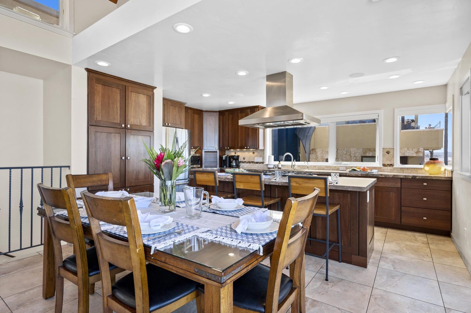 Modern kitchen with dining table.