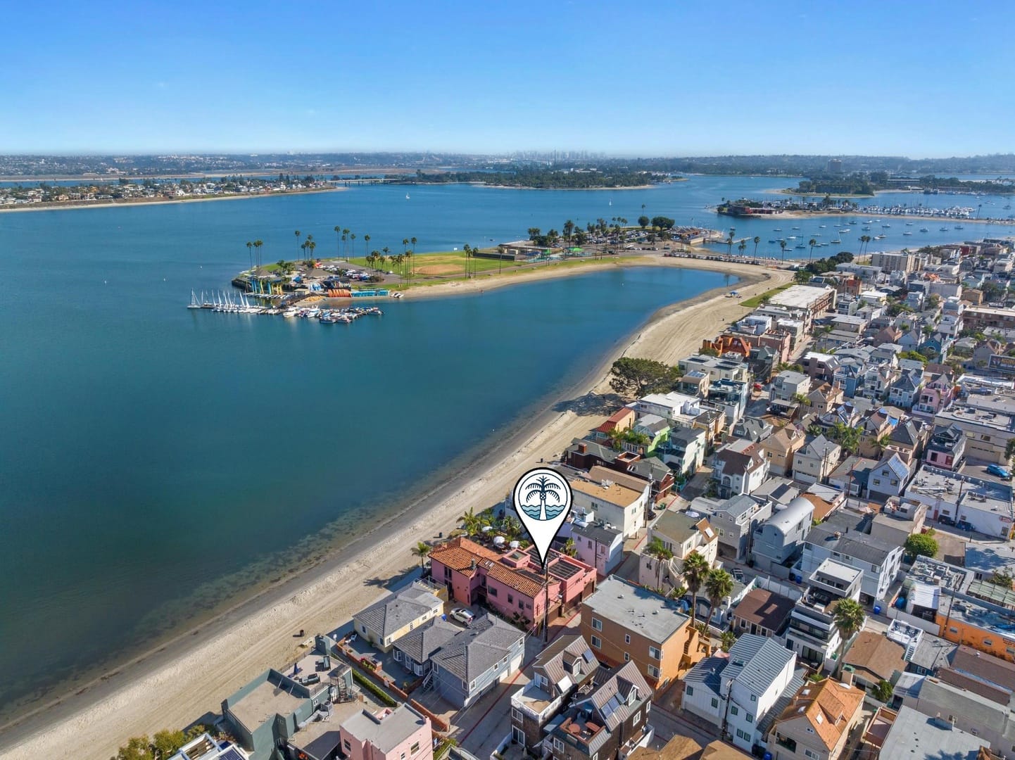 Aerial view of beachfront neighborhood.