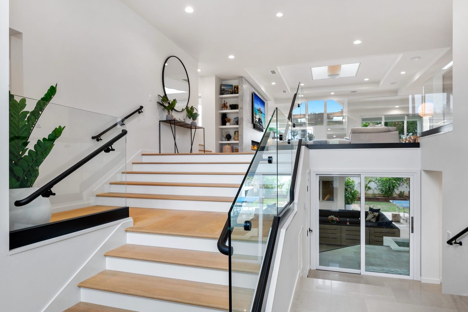 Modern split-level home interior stairs.