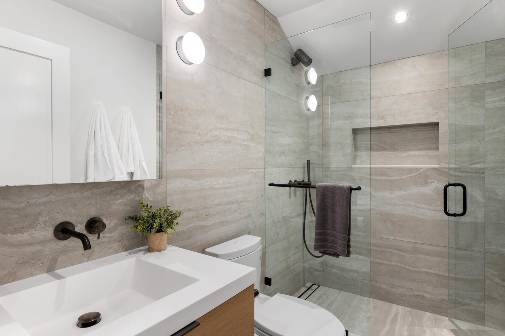 Modern bathroom with glass shower.