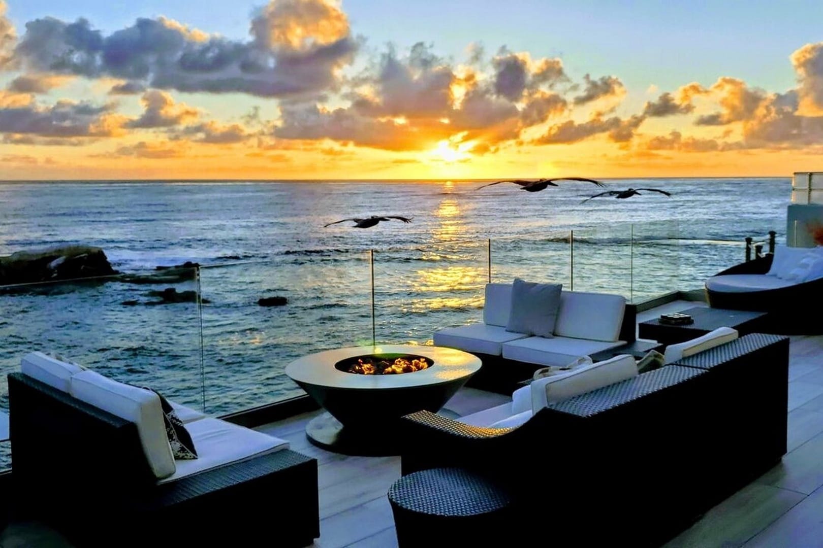 Oceanfront patio at sunset.