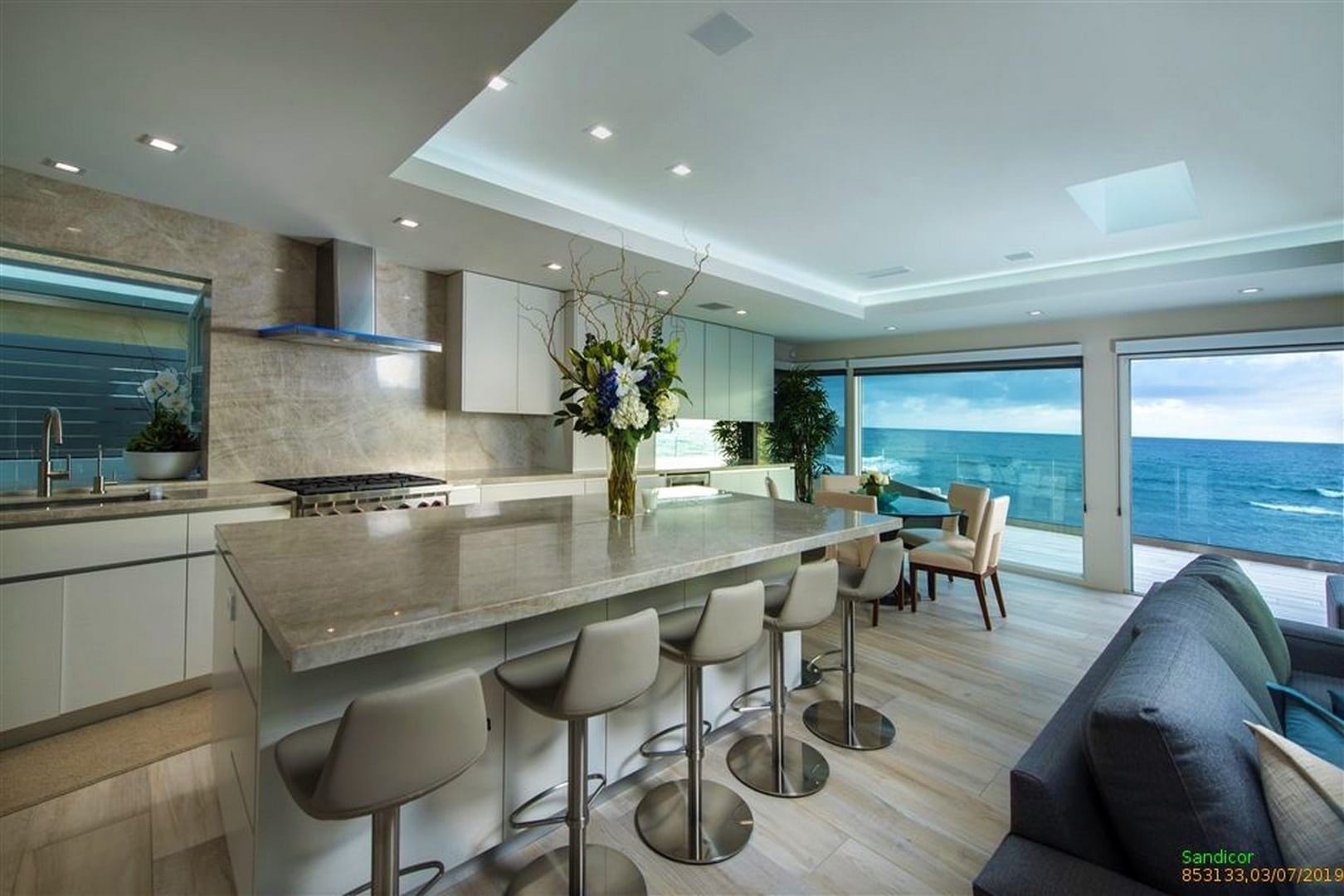 Modern kitchen with ocean view.