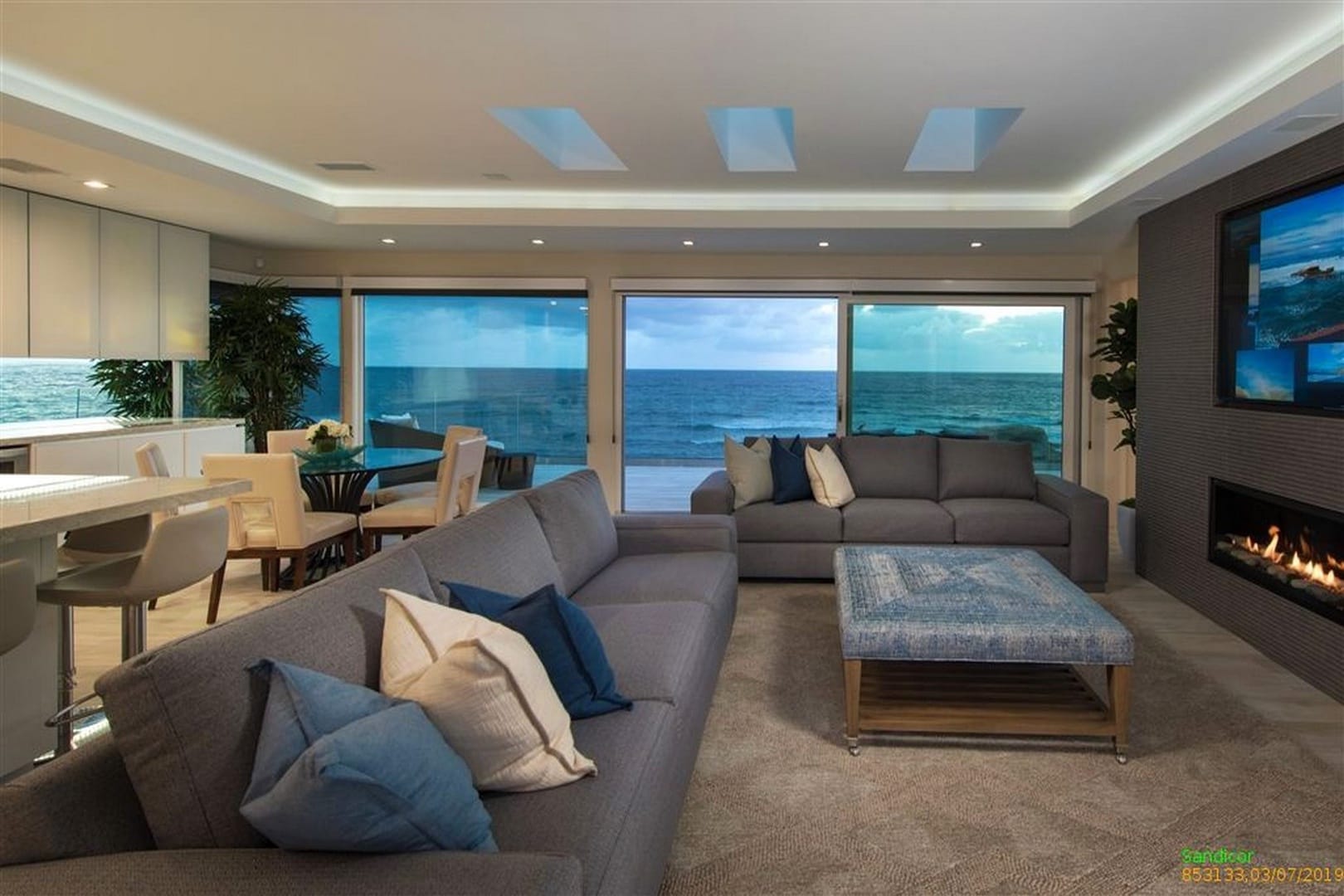 Ocean-view modern living room interior.