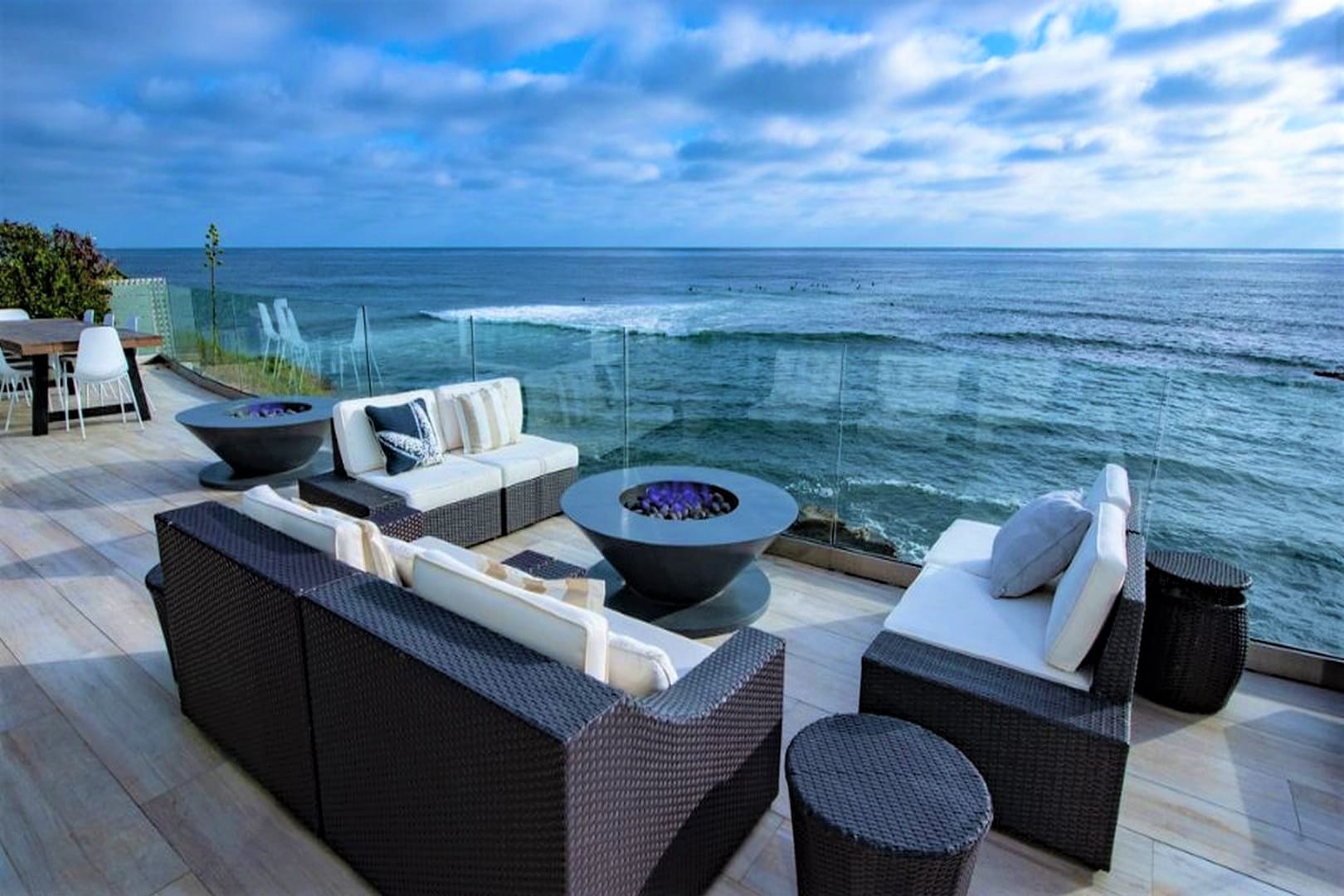 Oceanview patio with modern furniture.