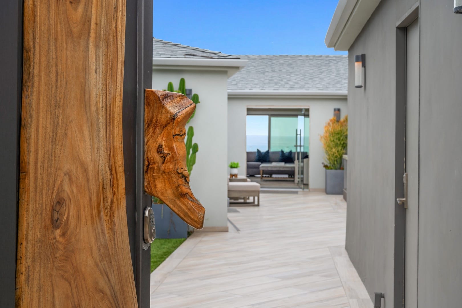 Wooden door leads to patio.