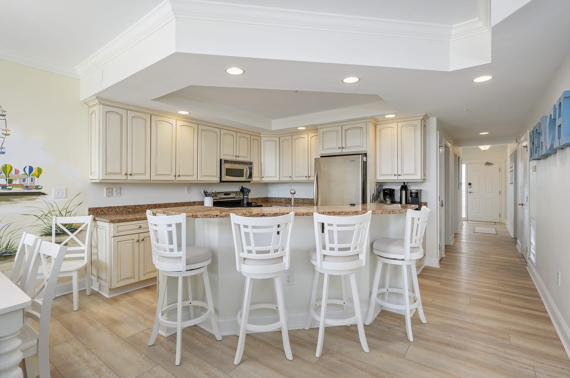 Bright kitchen with barstools.