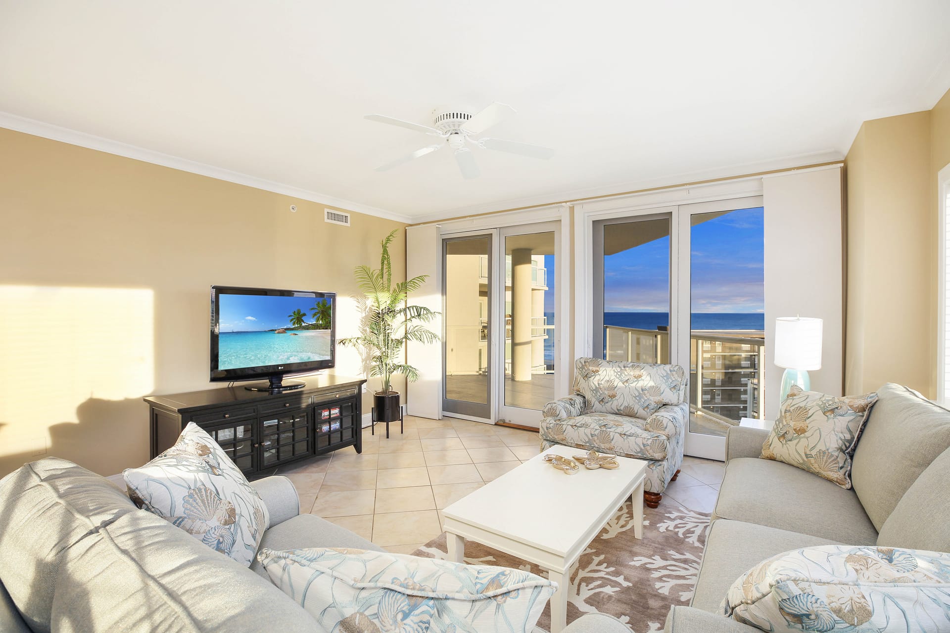 Beachfront living room with TV.