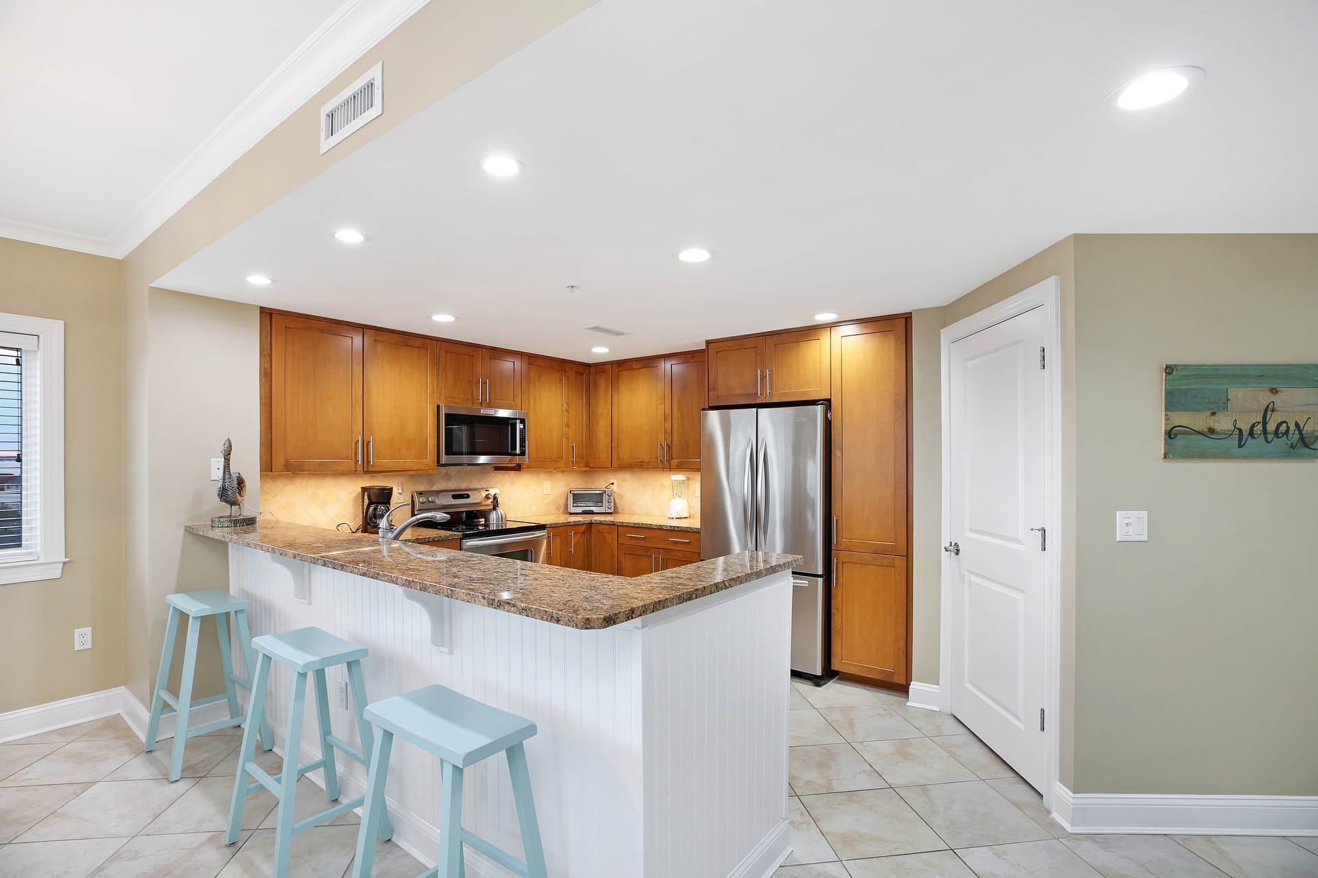 Modern kitchen with wooden cabinets.