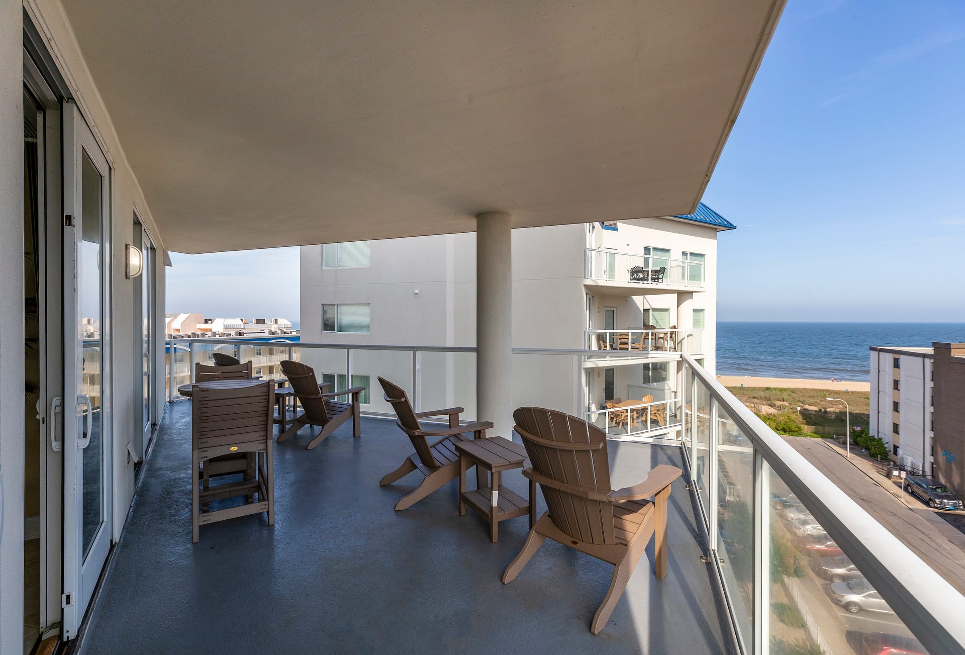 Balcony with ocean view chairs.