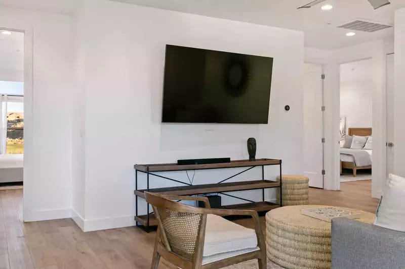 Modern living area with TV.