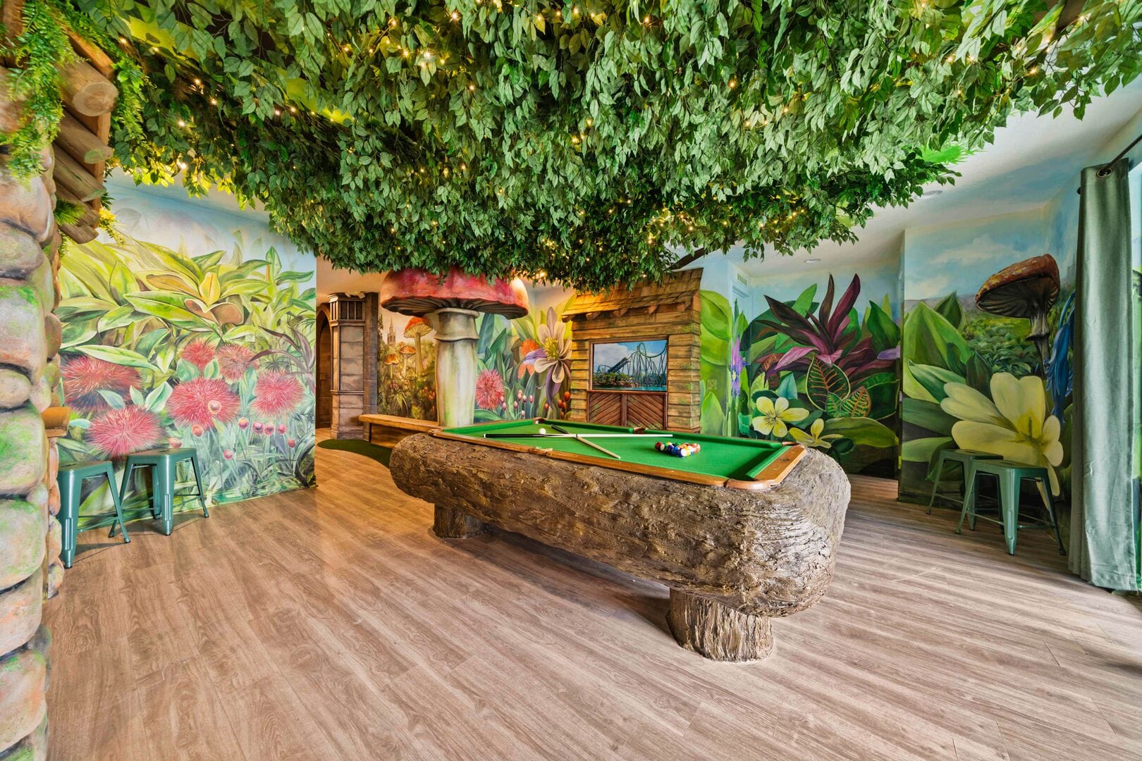 Nature-themed room with pool table.