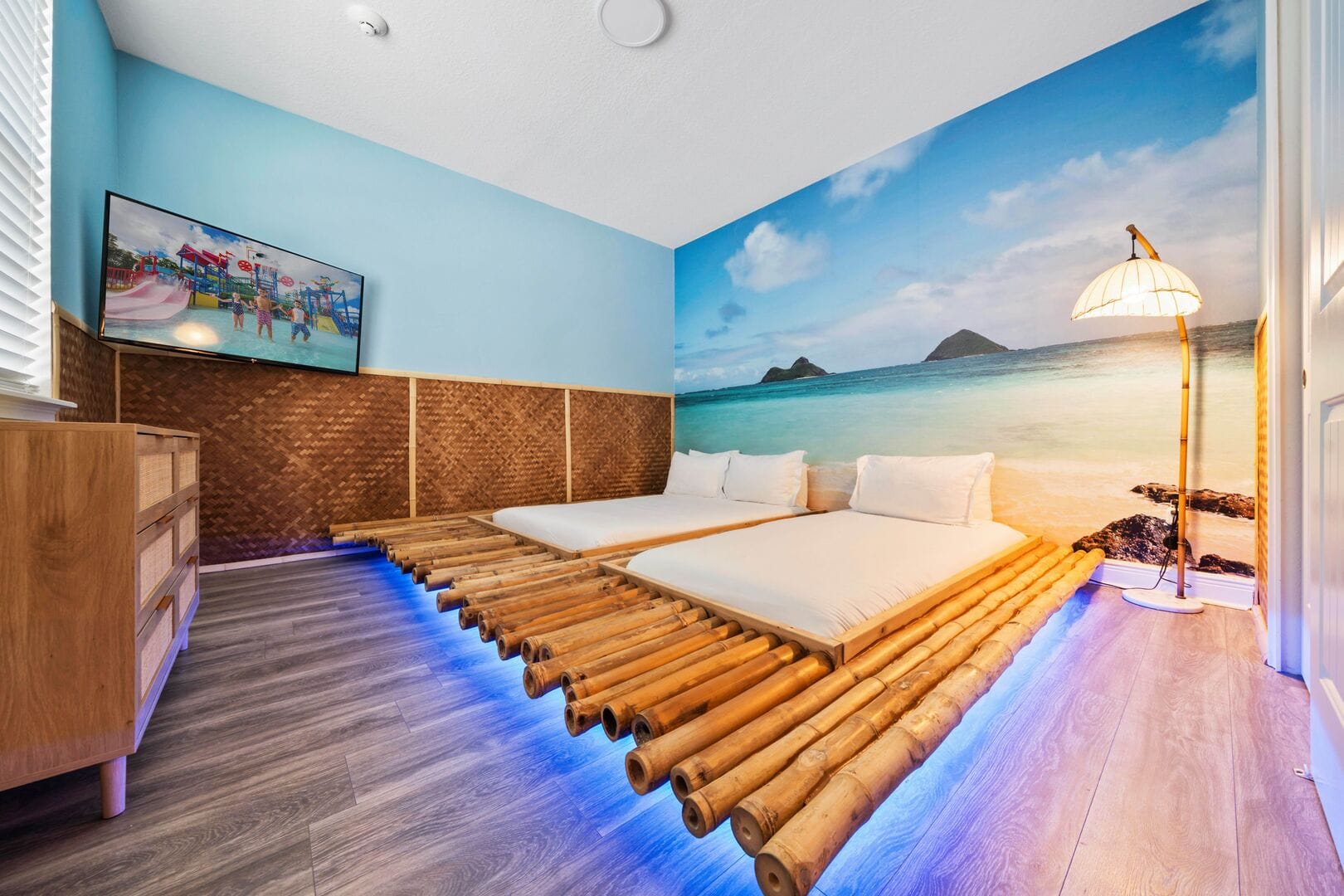 Beach-themed bedroom with bamboo beds.