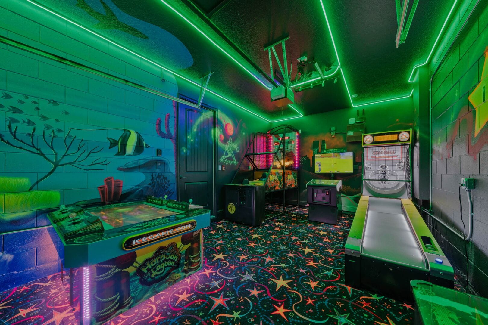 Neon-lit arcade room with games.