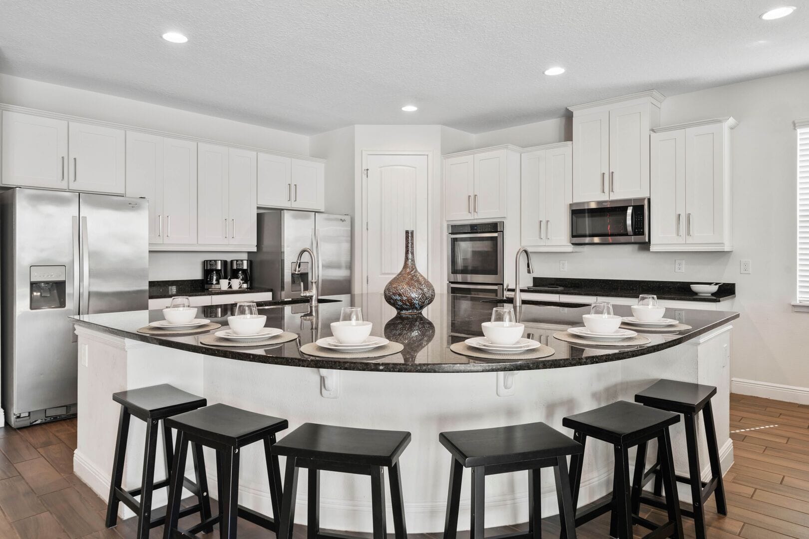 Modern kitchen with island seating.