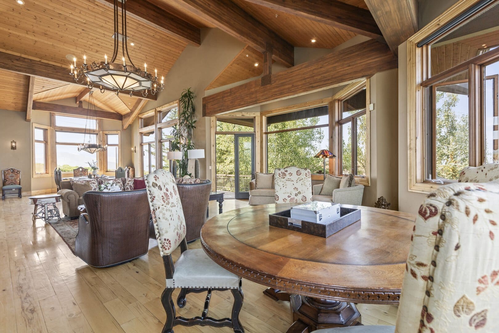 Spacious living room with wooden ceiling.