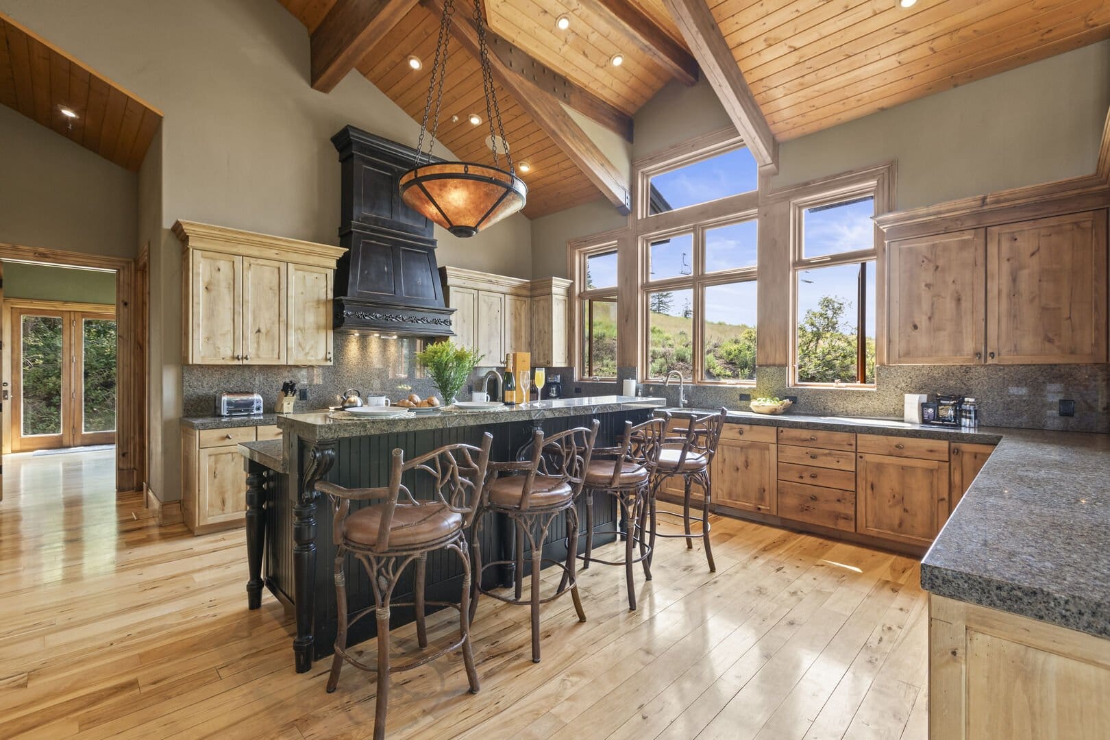 Rustic kitchen with wooden cabinets.