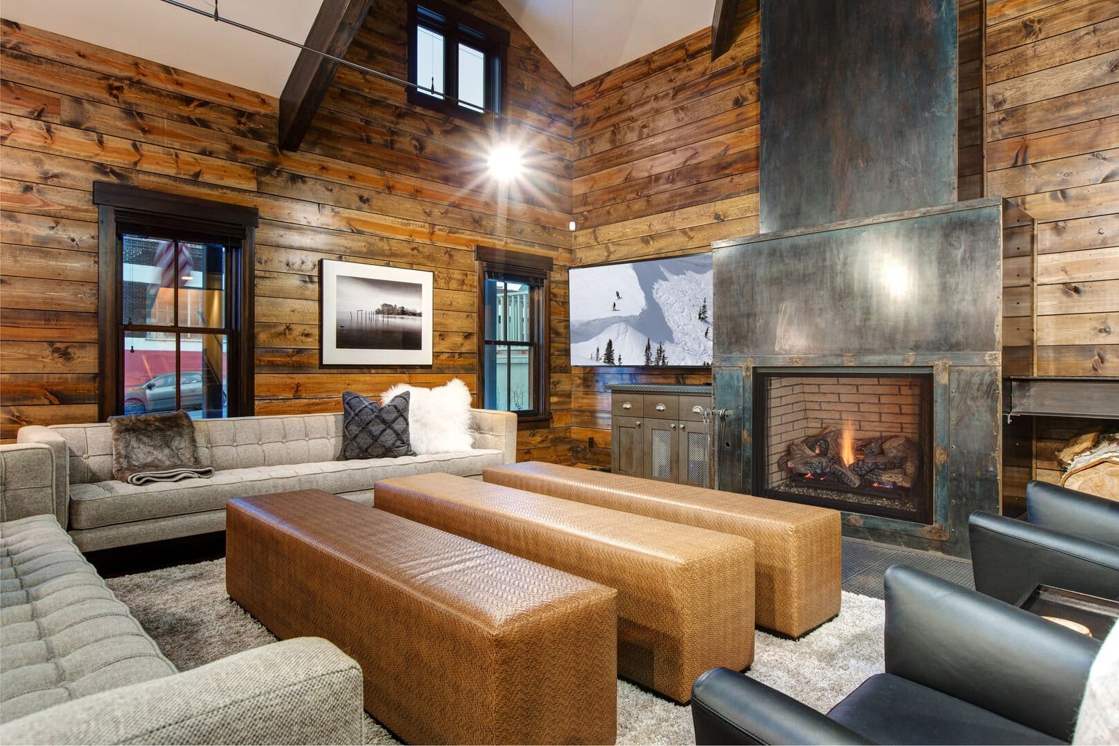 Cozy rustic living room with fireplace.