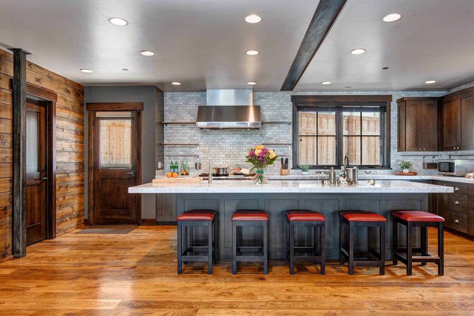 Modern kitchen with bar stools.