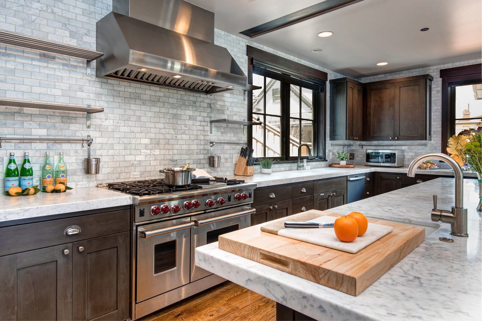 Modern kitchen with marble countertops.